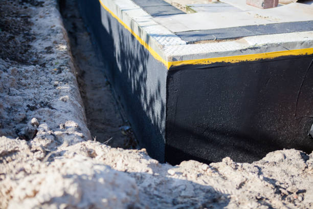 Professional Wet Basement Repair technician working in Newport, KY